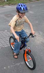 D riding his bike! There were times we thought we would never see this. Here he is off to the Marcham playground