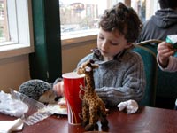 In the cafe, D with Hedgie the hedgehog and Giraffe